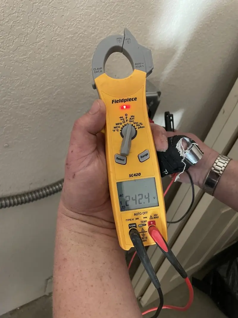 Voltage testing with clamp meter during Generator Installation in Grove City